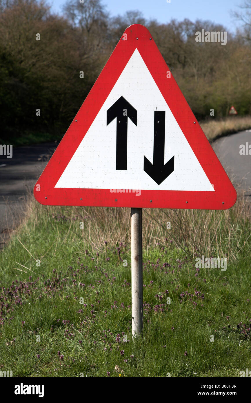 Red triangle sign two way traffic Stock Photo