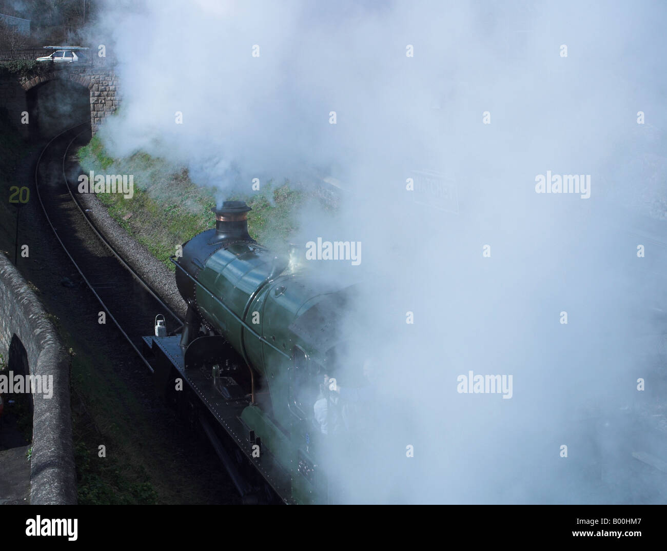 Steam train leaving Watchet Station. Somerset Stock Photo