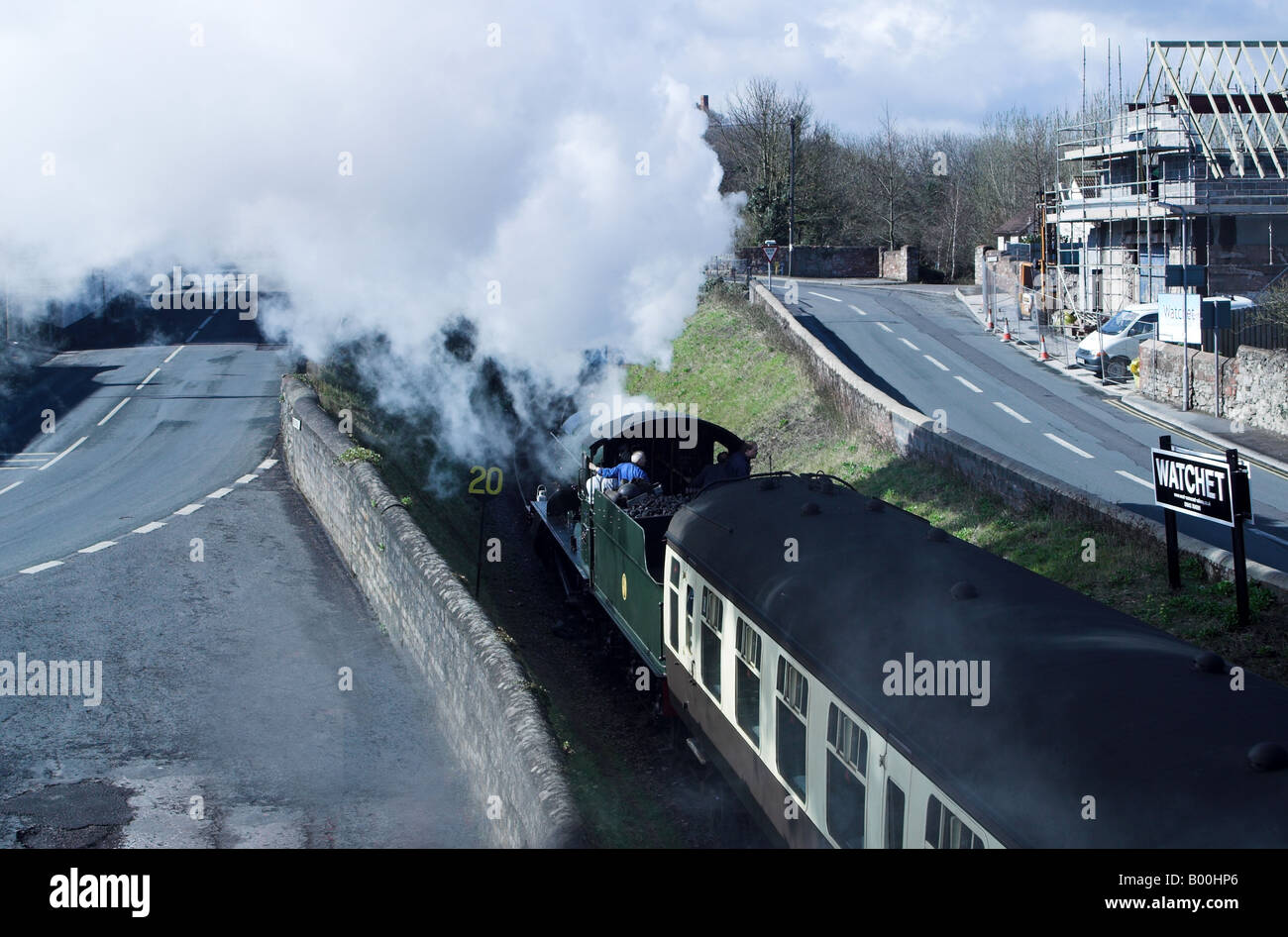 Steam train leaving Watchet Station. Somerset Stock Photo