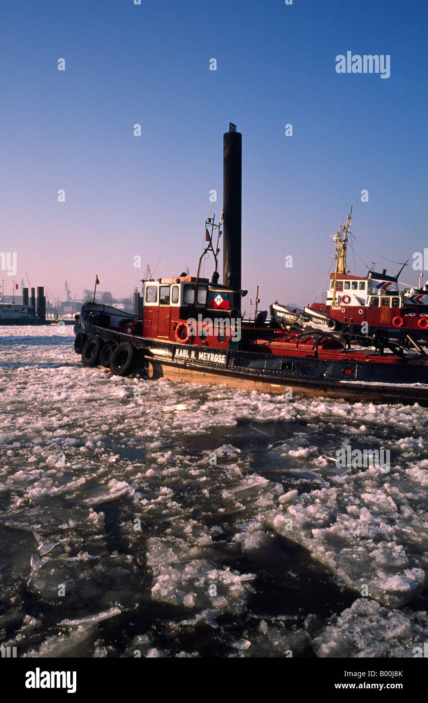 Jan 20, 2006 – Pilot boats on the frozen river Elbe at the German port of Hamburg. Stock Photo