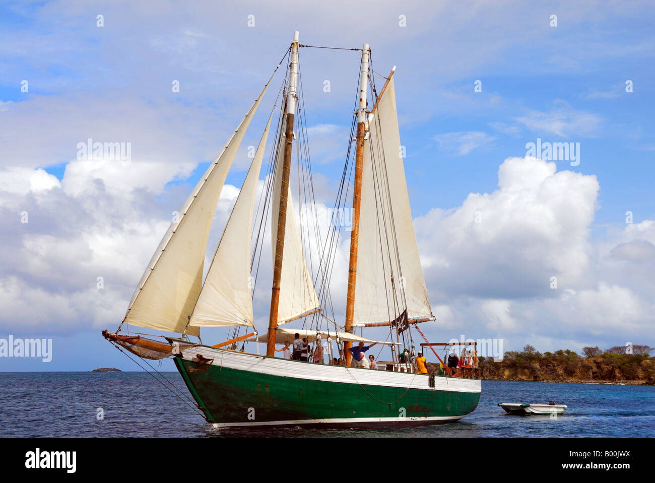 Old, gaff-rigged schooner in Saline Bay, Mayreau, Grenadines, Caribbean Stock Photo