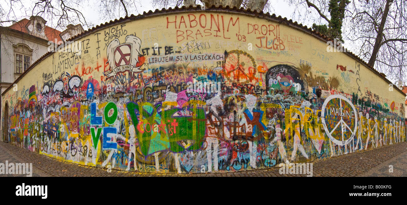 A 2 picture panoramic stitch of the Lennon Wall of graffiti in Prague. Stock Photo