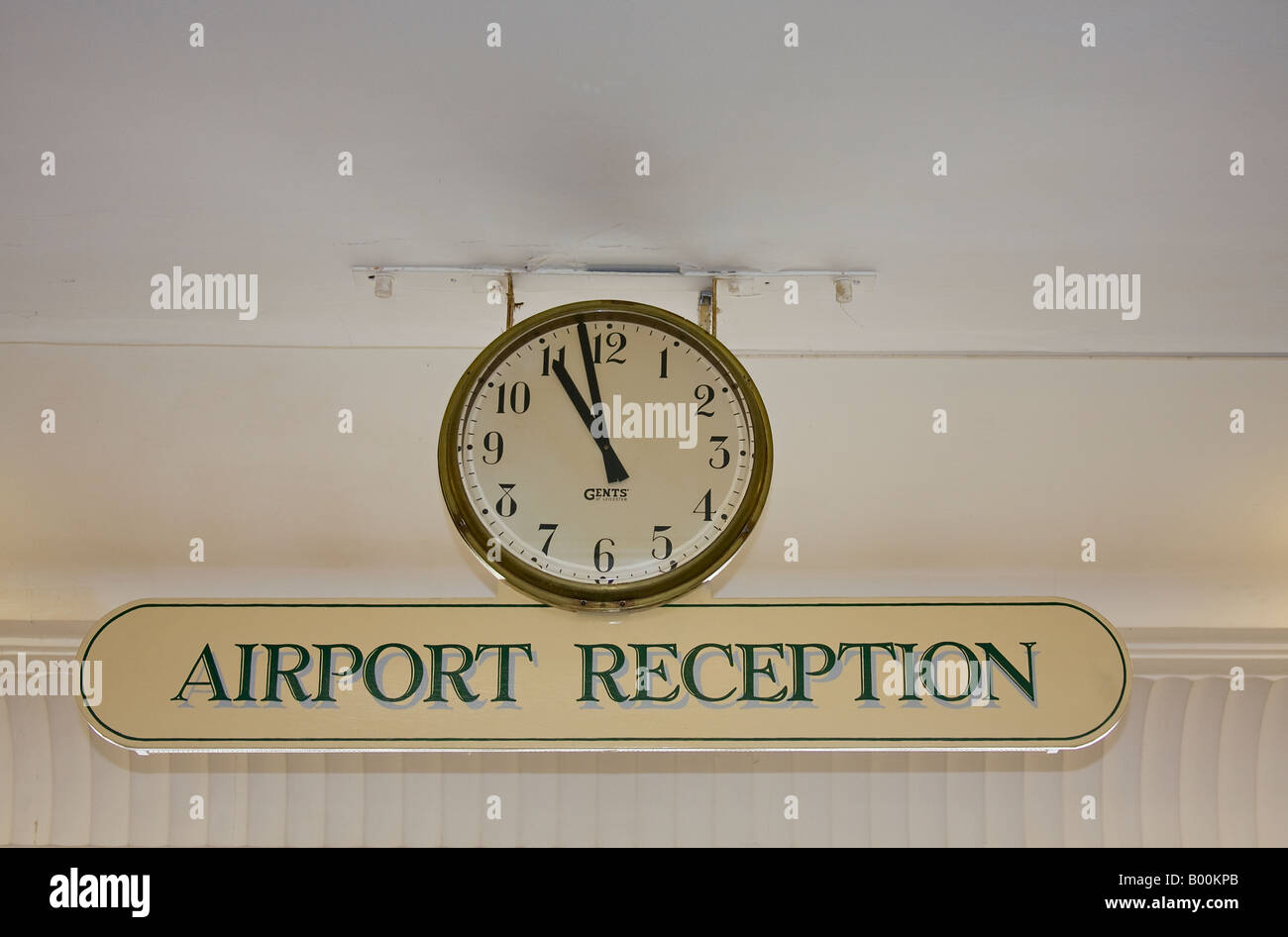 Clock and reception sign,Shoreham airport, Sussex. UK Stock Photo