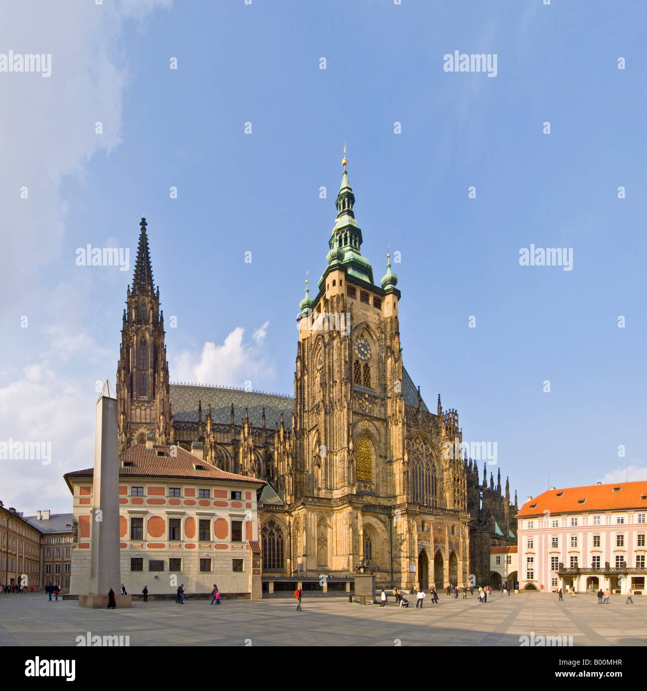 A 2 picture panoramic stitch of tourists around Saint Vitus's Cathedral located within the grounds of Prague Castle. Stock Photo