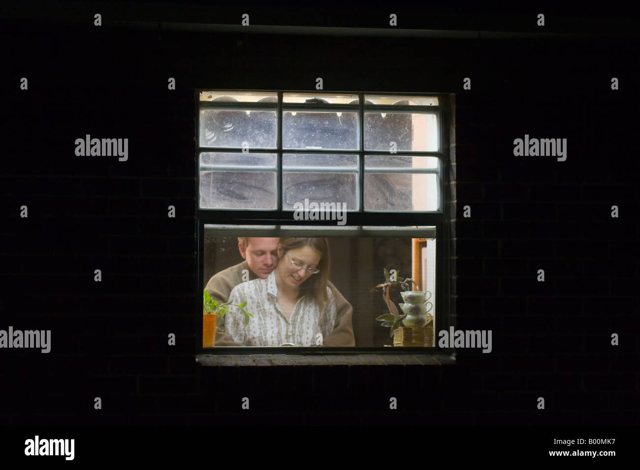 Husband and wife in the kitchen Stock Photo Alamy