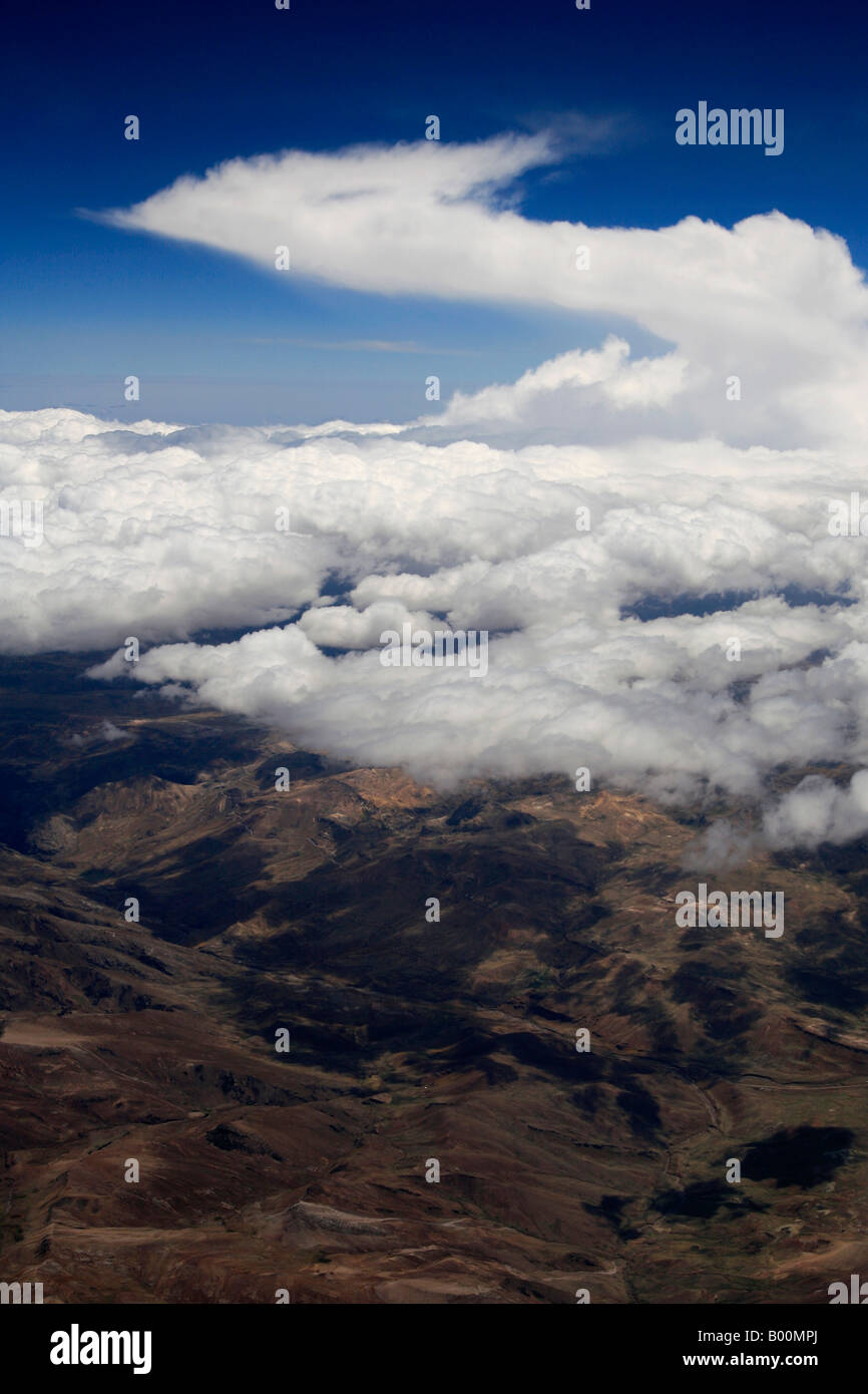 Cumulonimbus Incus clouds seen from an aeroplane over the Peruvian Andes mountain range South America Stock Photo