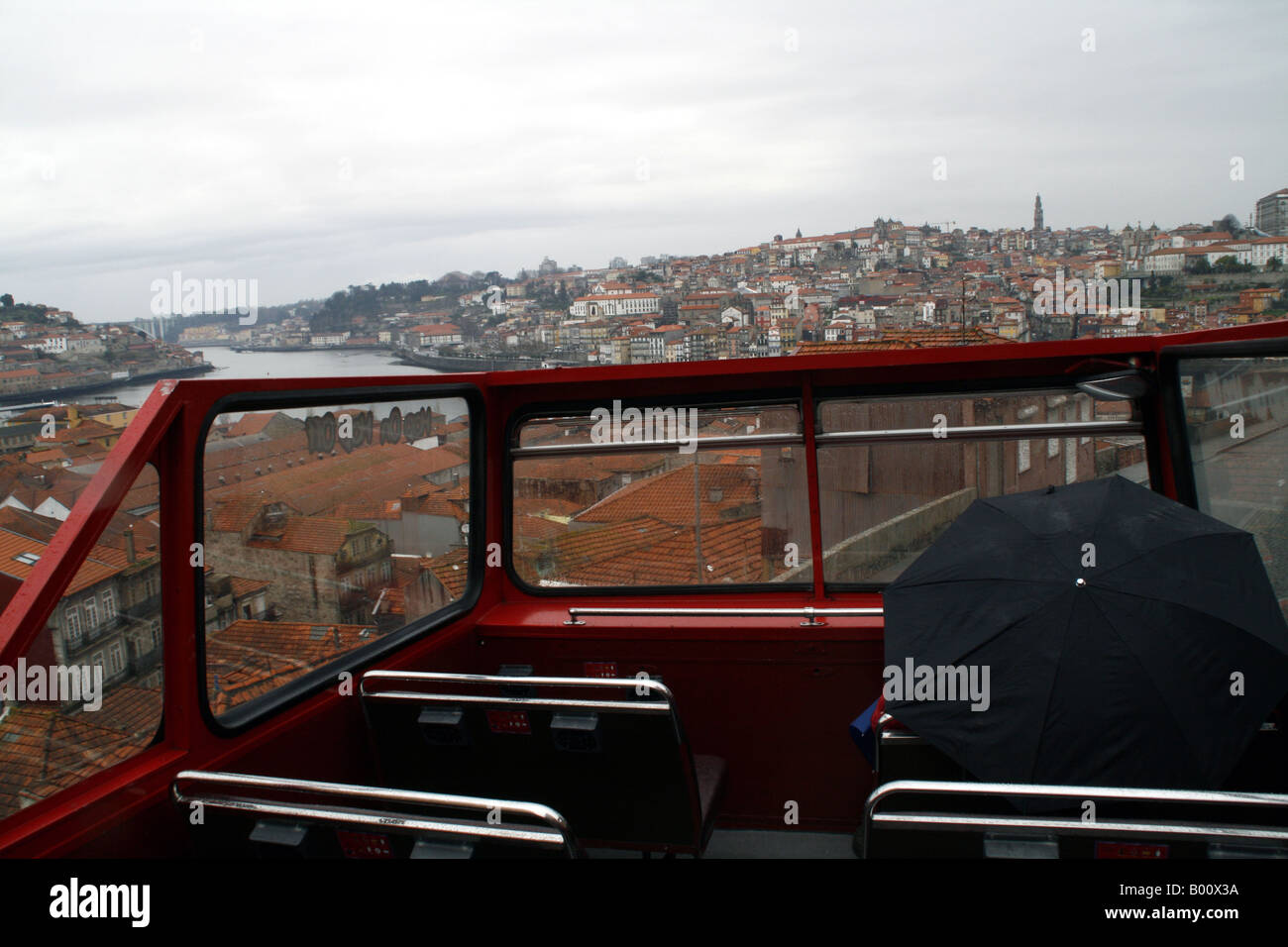 A rainy day in Porto on the city tour by double decker London bus Stock Photo