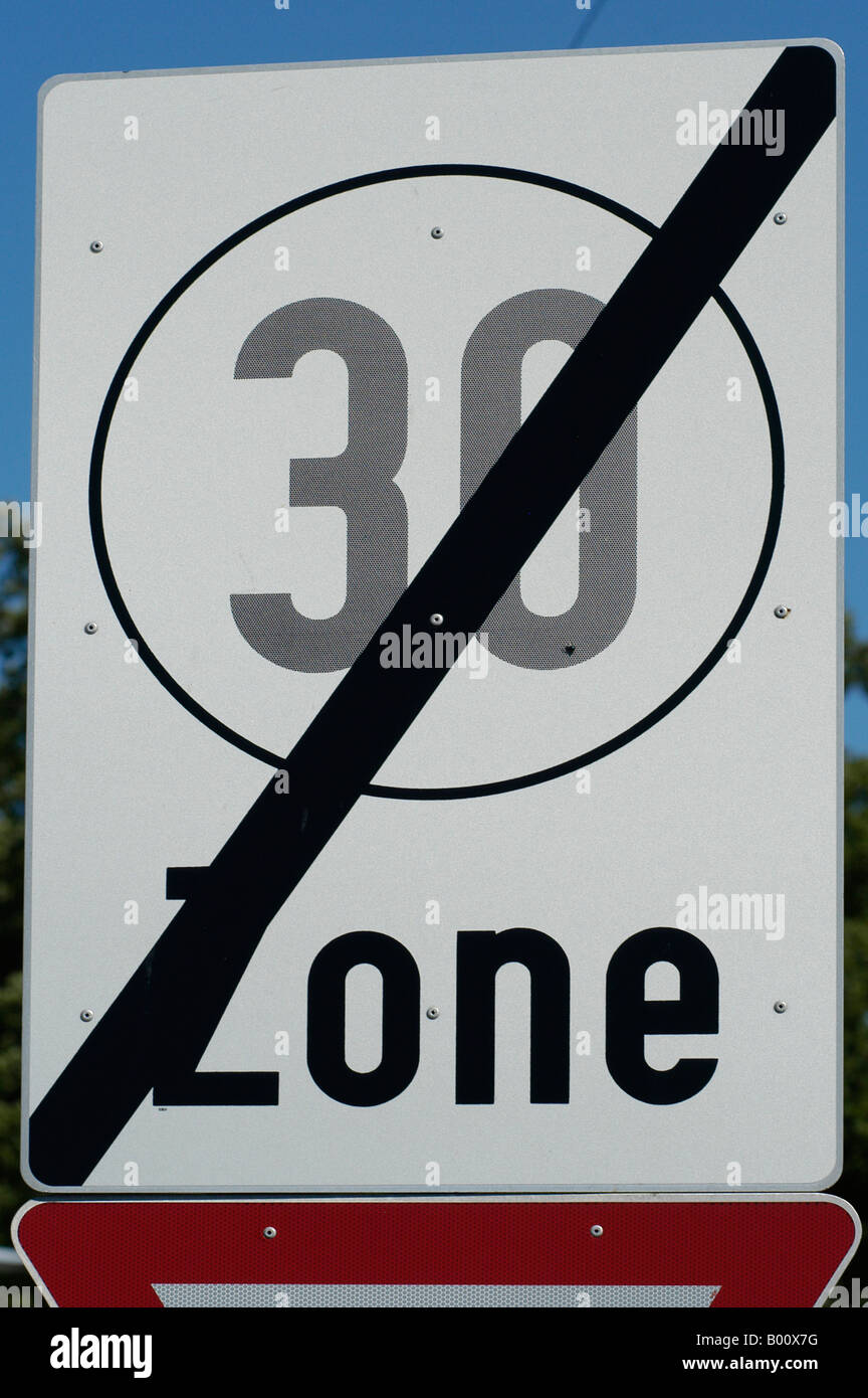 Traffic sign 30's zone terminates Stock Photo - Alamy