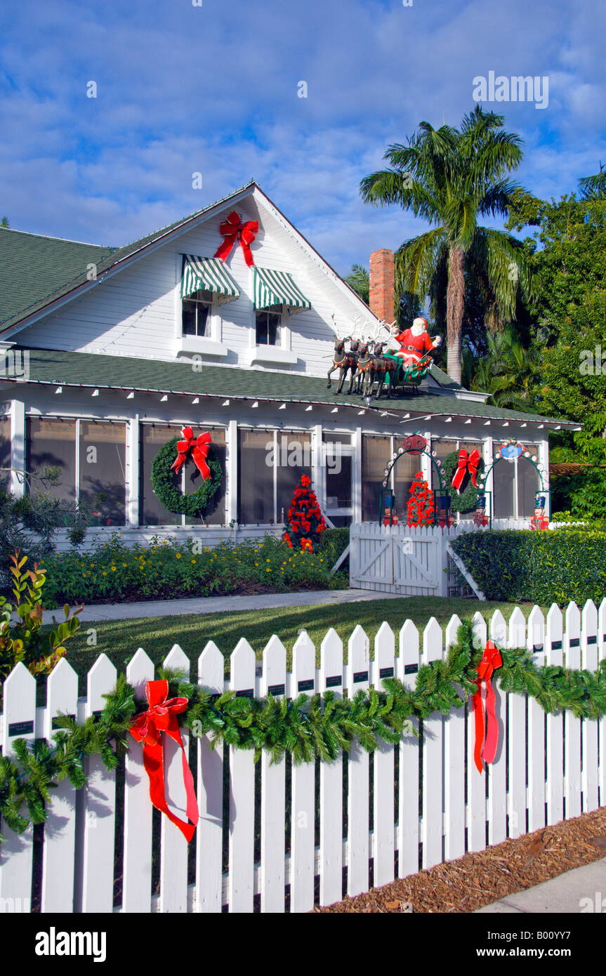 The historic Palm Cottage decorated for Christmas in Naples Florida USA