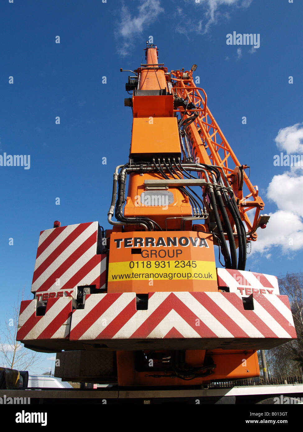 orange extension extendablle crane jib hydraulic Stock Photo Alamy