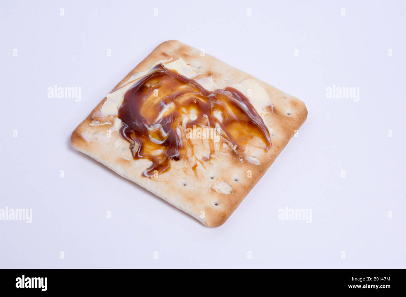 Cream Cracker With Marmite Stock Photo Alamy