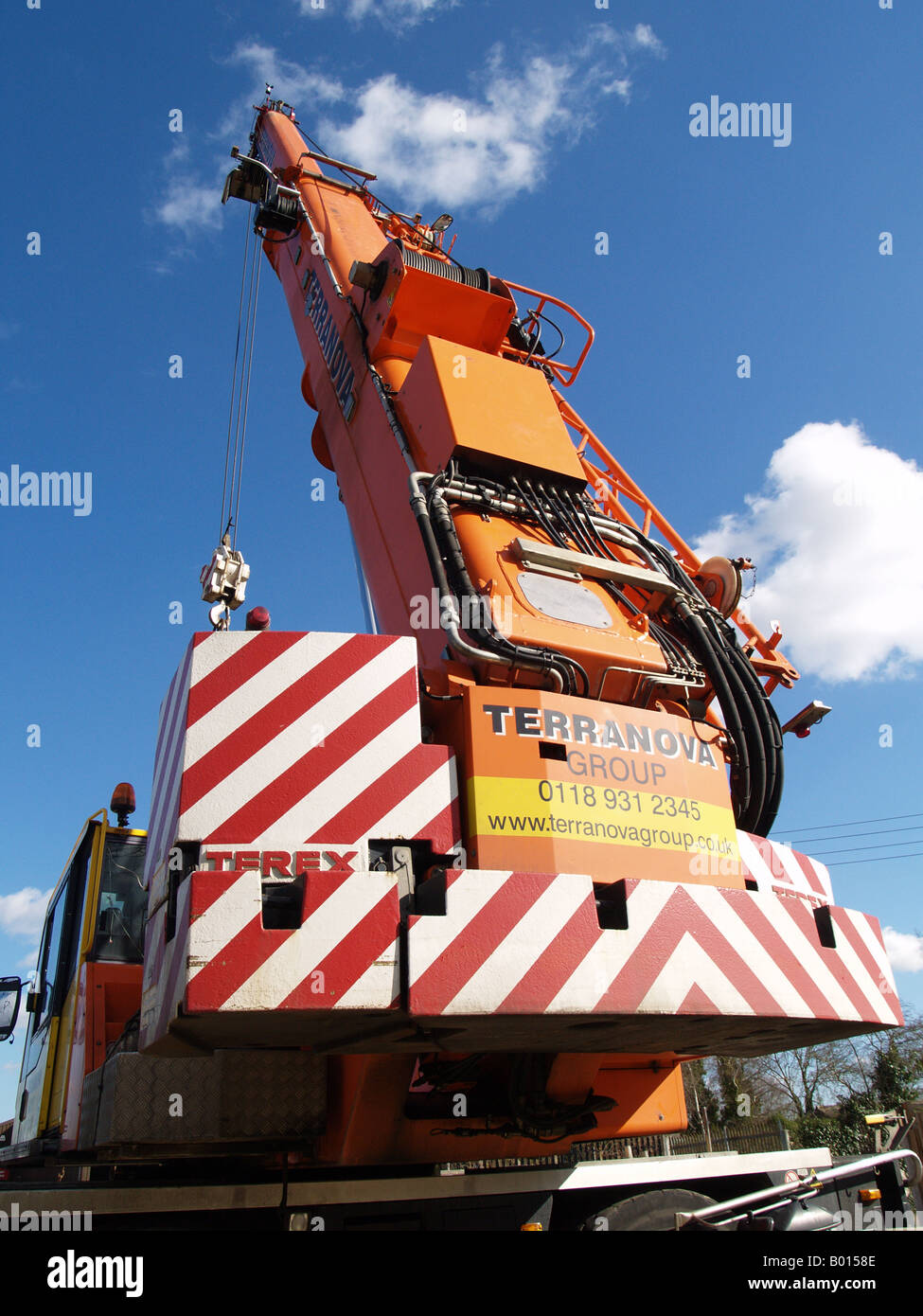 orange extension extendablle crane jib hydraulic Stock Photo Alamy