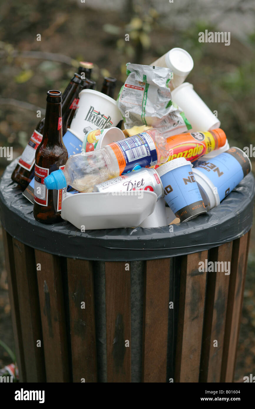overfilled rubbish or trash bin Stock Photo Alamy
