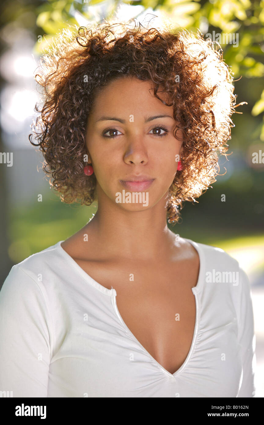 Young African mulata woman half German half Cuban in a park Stock Photo Alamy