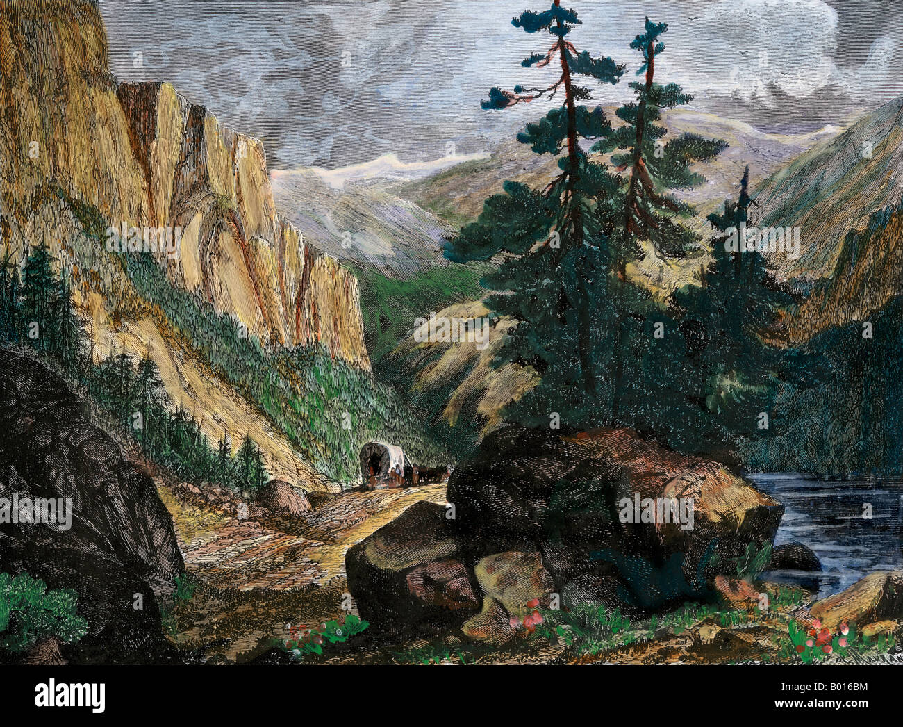 Covered wagons crossing the Rocky Mountains of Colorado 1800s. Hand-colored woodcut Stock Photo