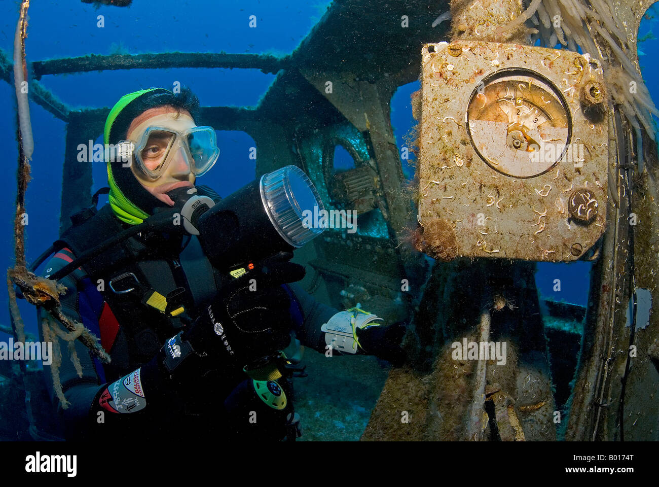 Diver in the wheelhouse of the P29 Stock Photo