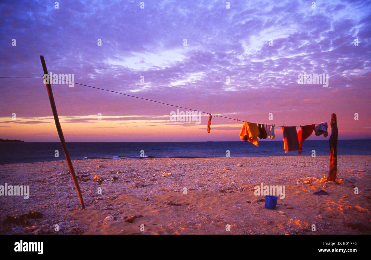 Clothes drying on a Washing Line at sunset on South Sea Island Fiji Stock Photo