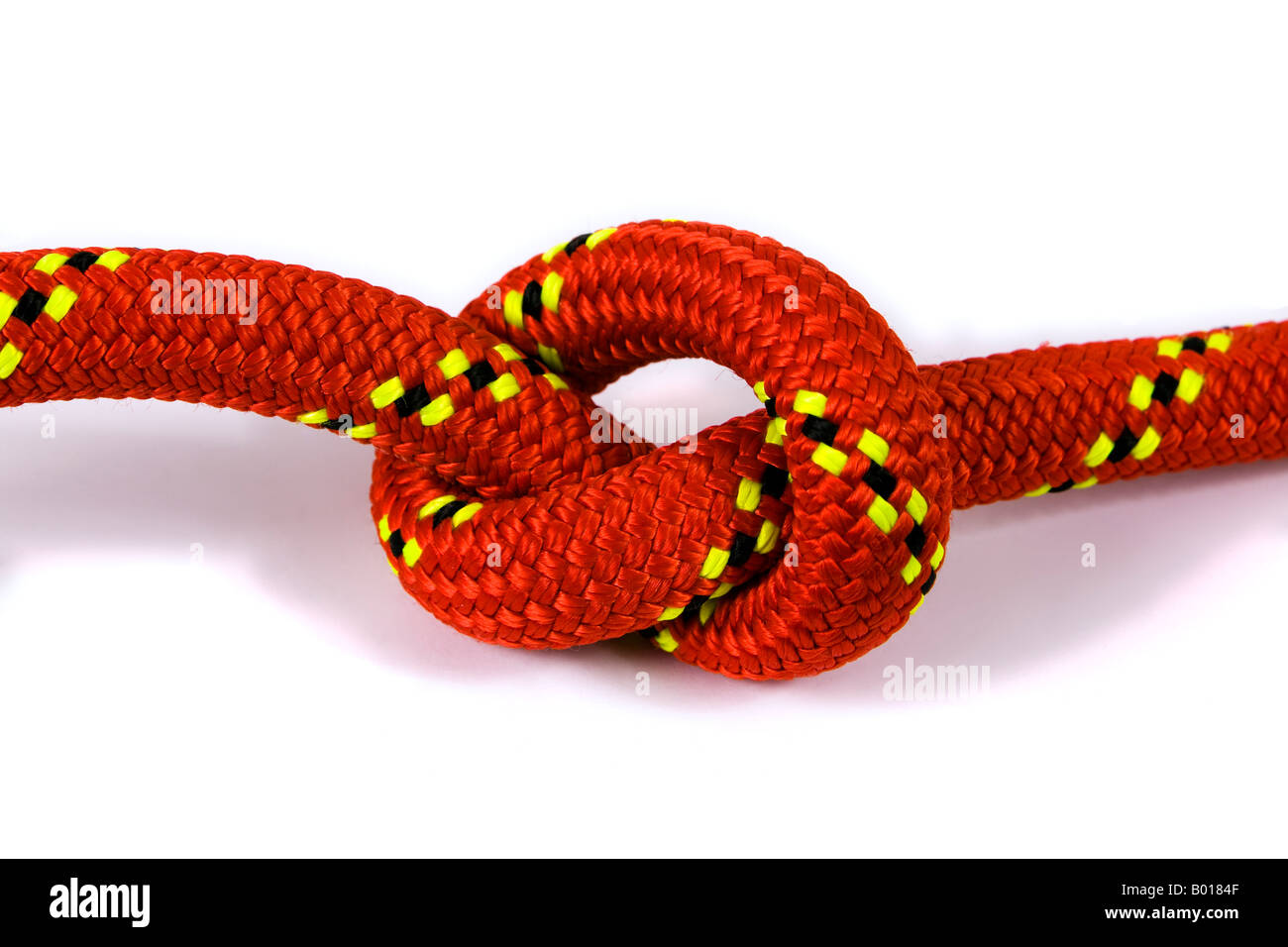Reef knot in red rope. Stock Photo