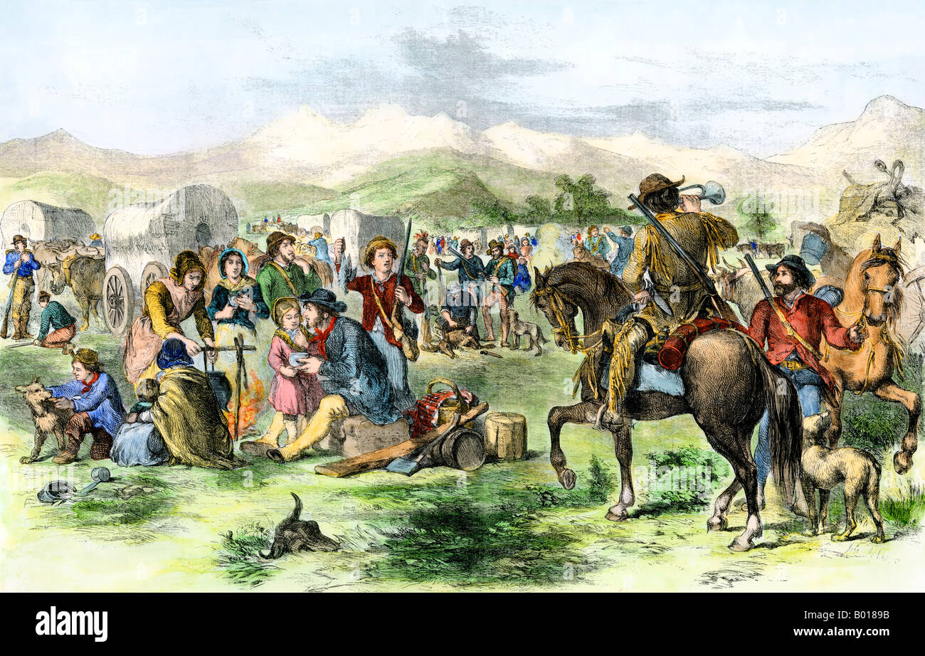 California migrants last camp on the plains before heading over the Rockies 1850s. Hand-colored woodcut Stock Photo
