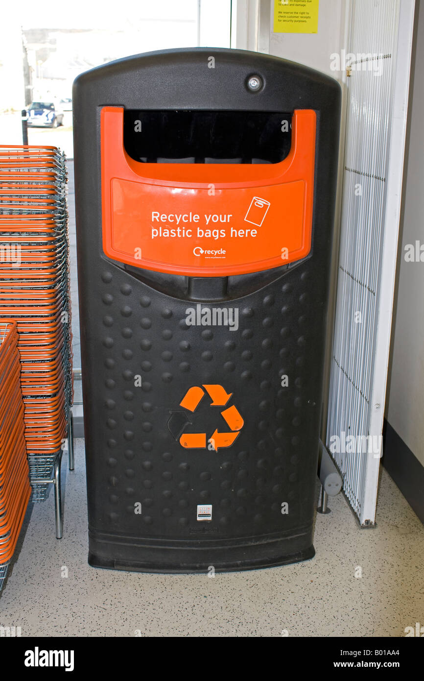 Bin for recycling used plastic bags Sainsbury supermarket Cheltenham UK Stock Photo