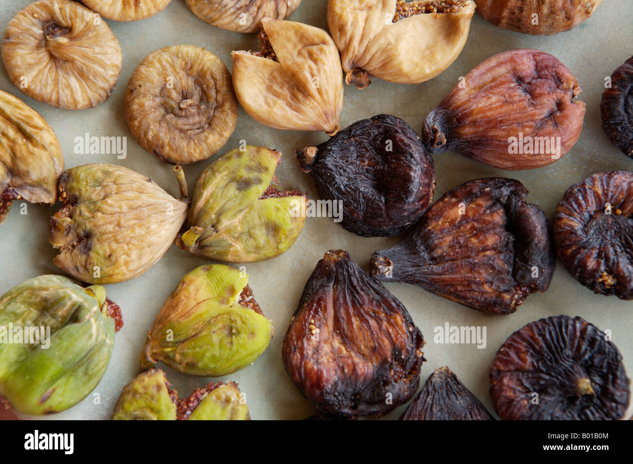ripe Figs layed out for drying, COMMON NAME Fig, LATIN NAME Ficus