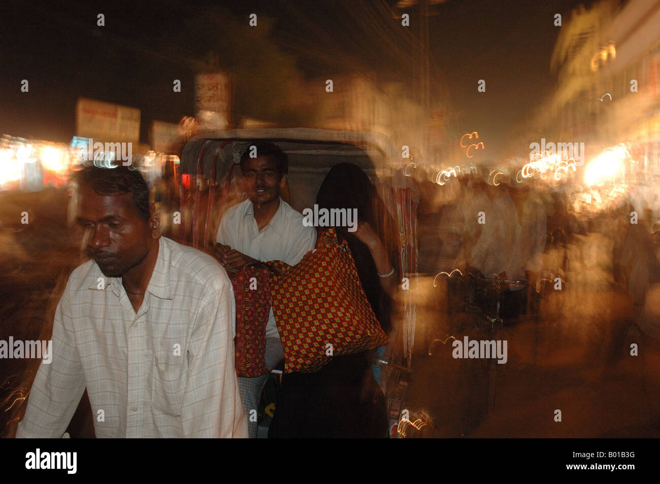 Indian Night Riders Indian rickshaw rider with passenger at night, Varansi Stock Photo - Alamy