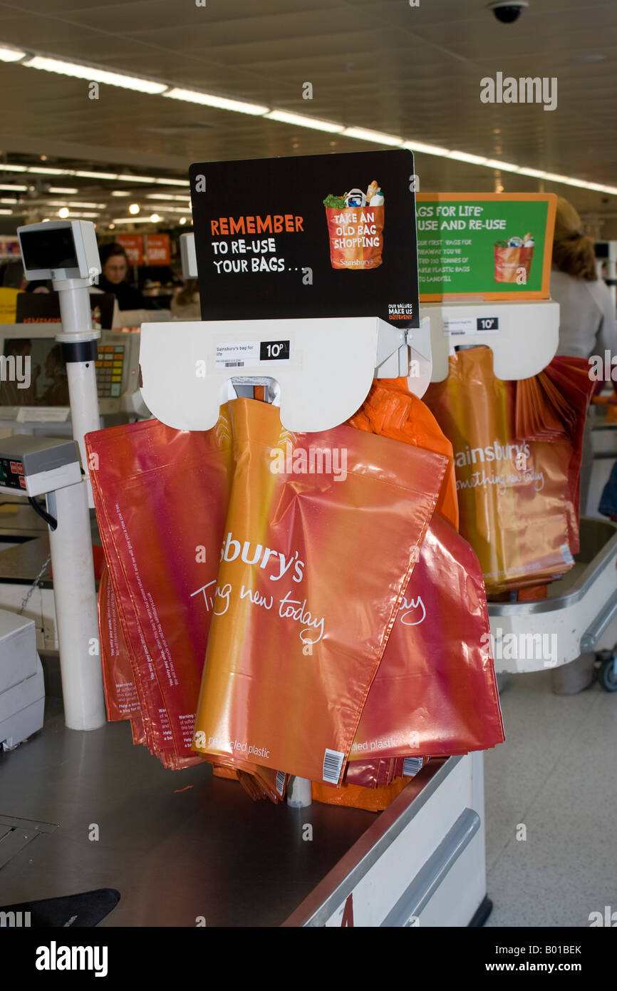 Reuse shopping bags at checkout Sainsburys supermarket Cheltenham UK