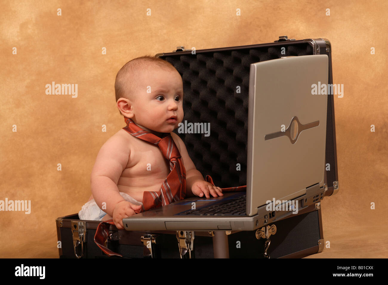 New Baby Computer User Error Problem IT Helpdesk infant Support Stock Photo