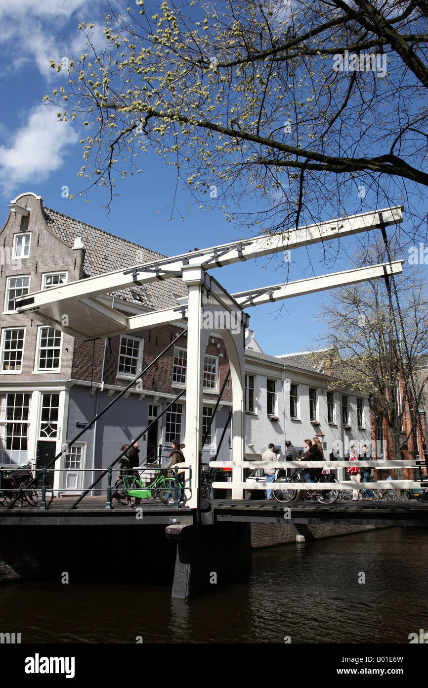 canal lift bridge over groenburgwal canal within the university district amsterdam netherlands north holland europe Stock Photo