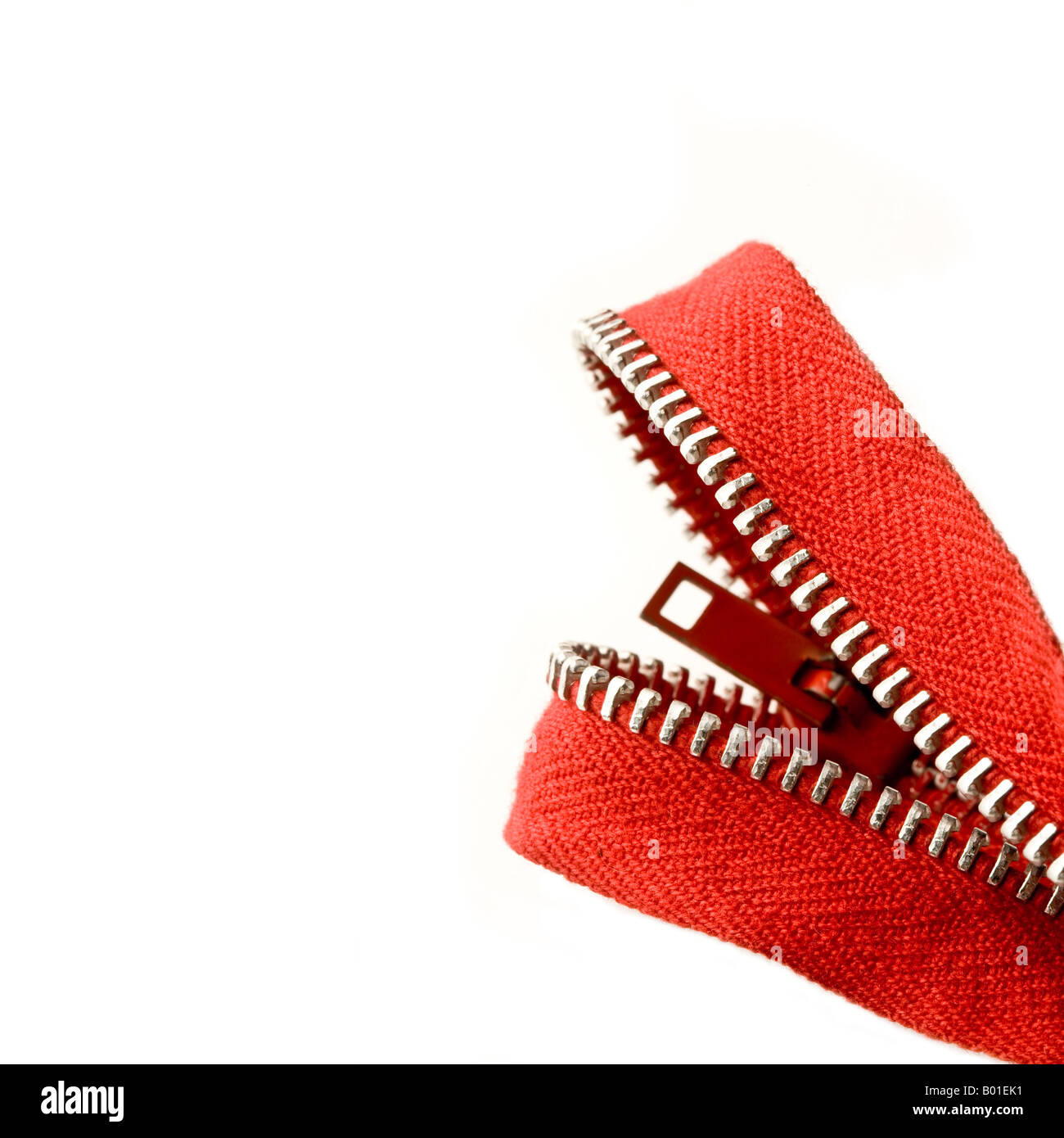 Image of a mouth made from a red zipper Stock Photo
