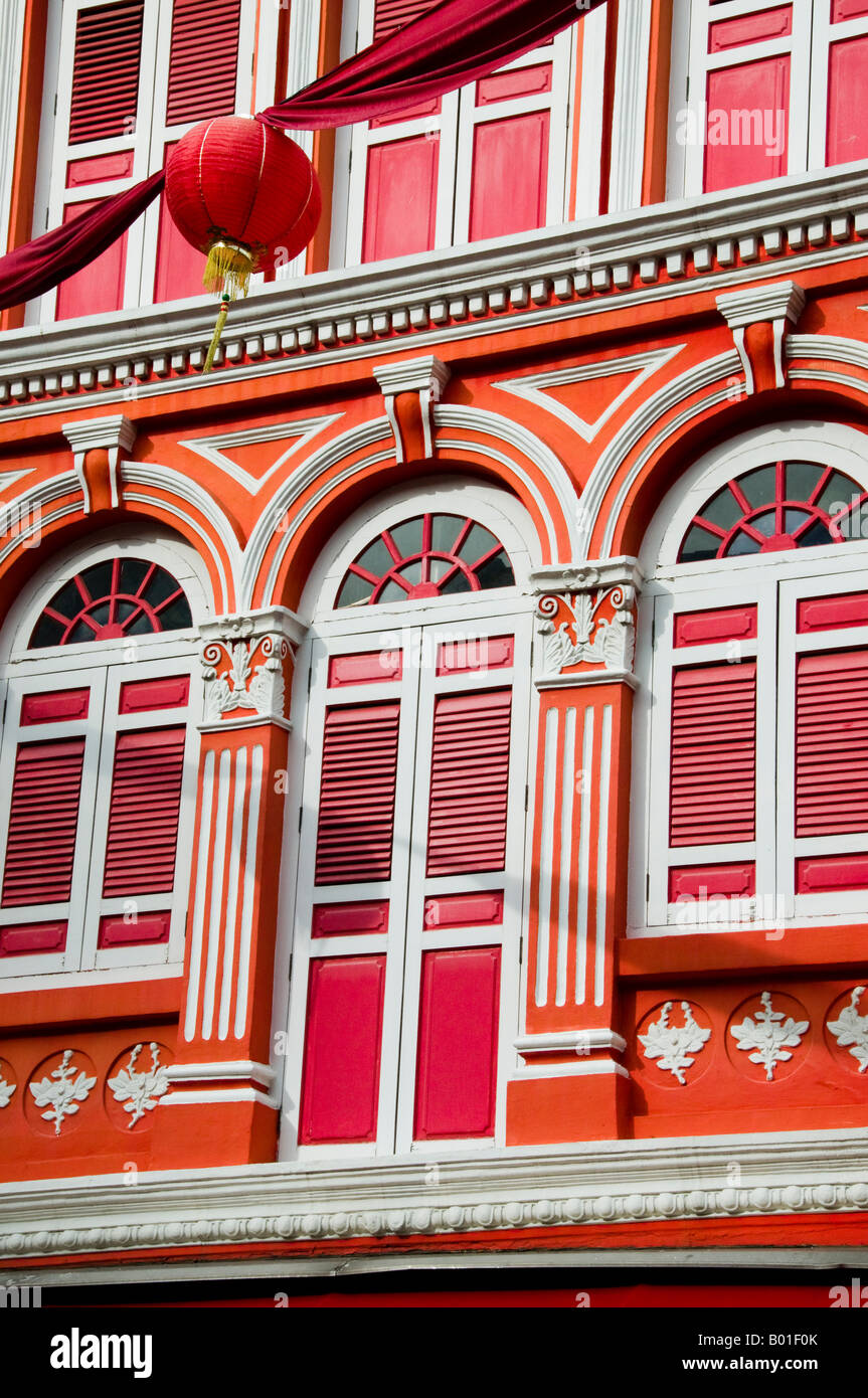 Image showcasing windows with shutters on second story apartment in Singapore Stock ...
