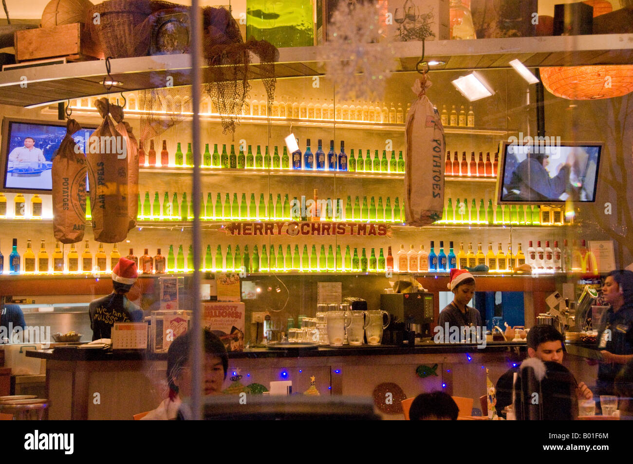 Interior view of bar restaurant with bottles on shelf Stock Photo Alamy