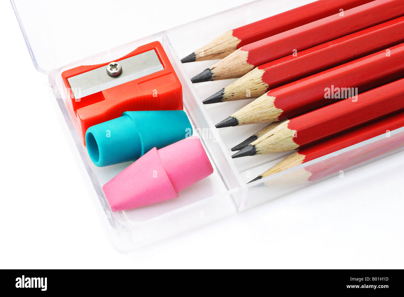 Pencils sharpener and erasers in plastic box on white background Stock