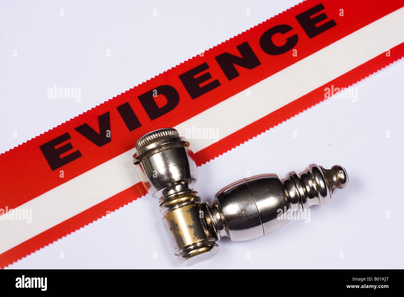 Marijuana pipe with Evidence sticker Stock Photo - Alamy