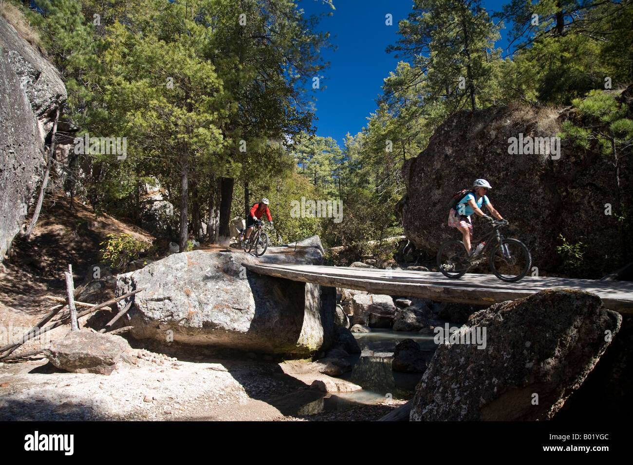 Rachel Schmidt and Scott Davis mountain biking in the Cusarare area in the Copper Canyon area
