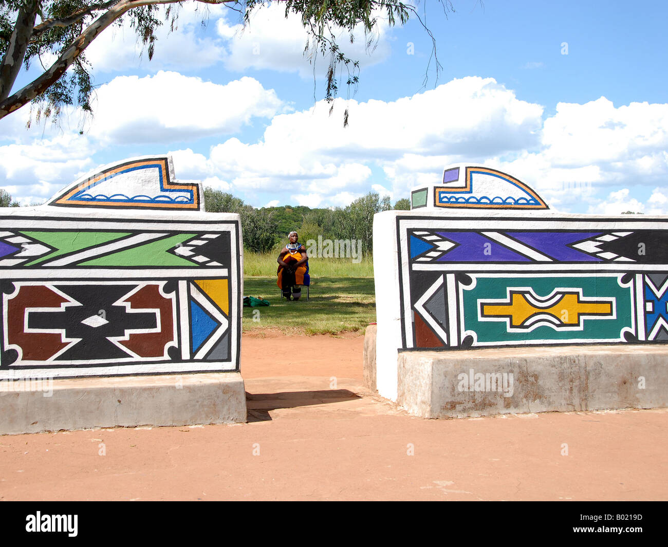 Two Ndebele woman in their traditional clothing in the museum village of Botshabelo in South Africa near Middelburg. Stock Photo