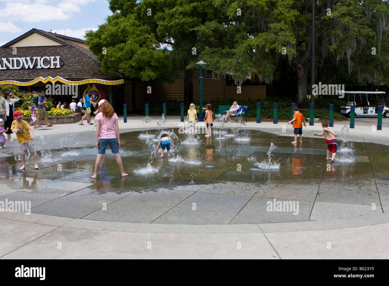 Children Playing in a Water Fountain Exhibit at Downtown Disney Marketplace in Orlando Florida