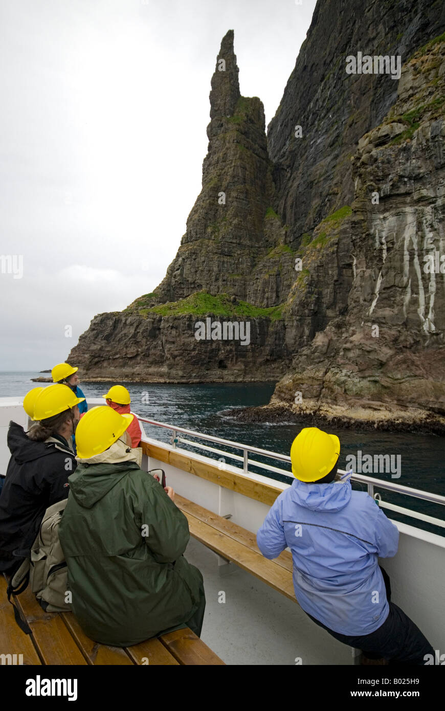 Tourist Boat Viewing The Bird Cliffs Of South West Vagar Faroe Islands