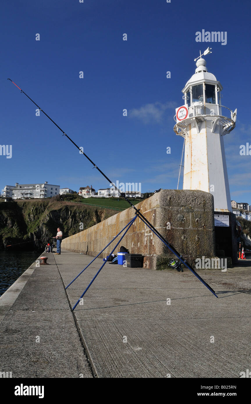 Sea Fishing from the Harbour wall. Stock Photo