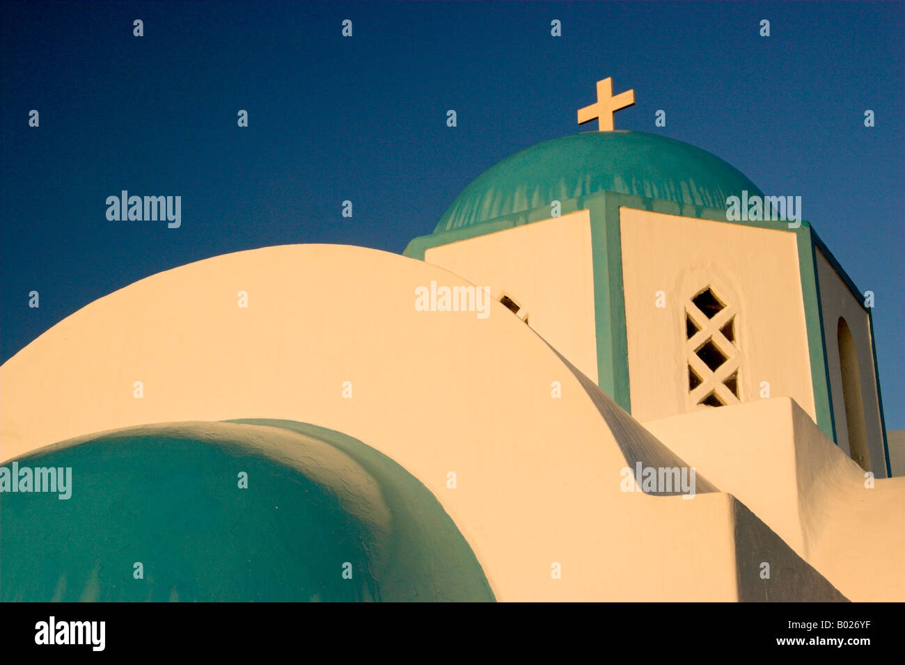 Greek Church Catching The Early Morning Sunlight Stock Photo