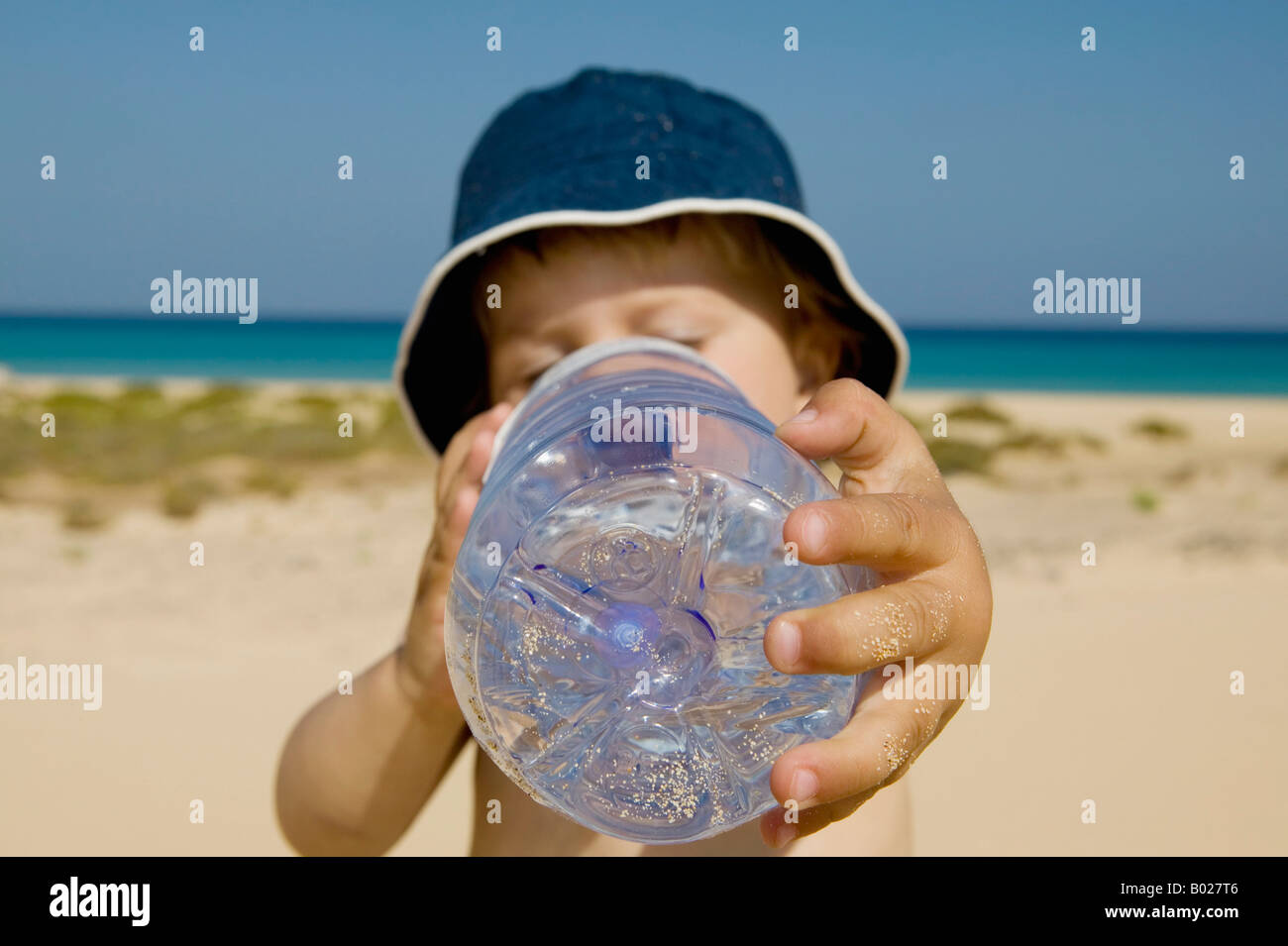 toddler drinking water from plastic bottle Stock Photo Alamy