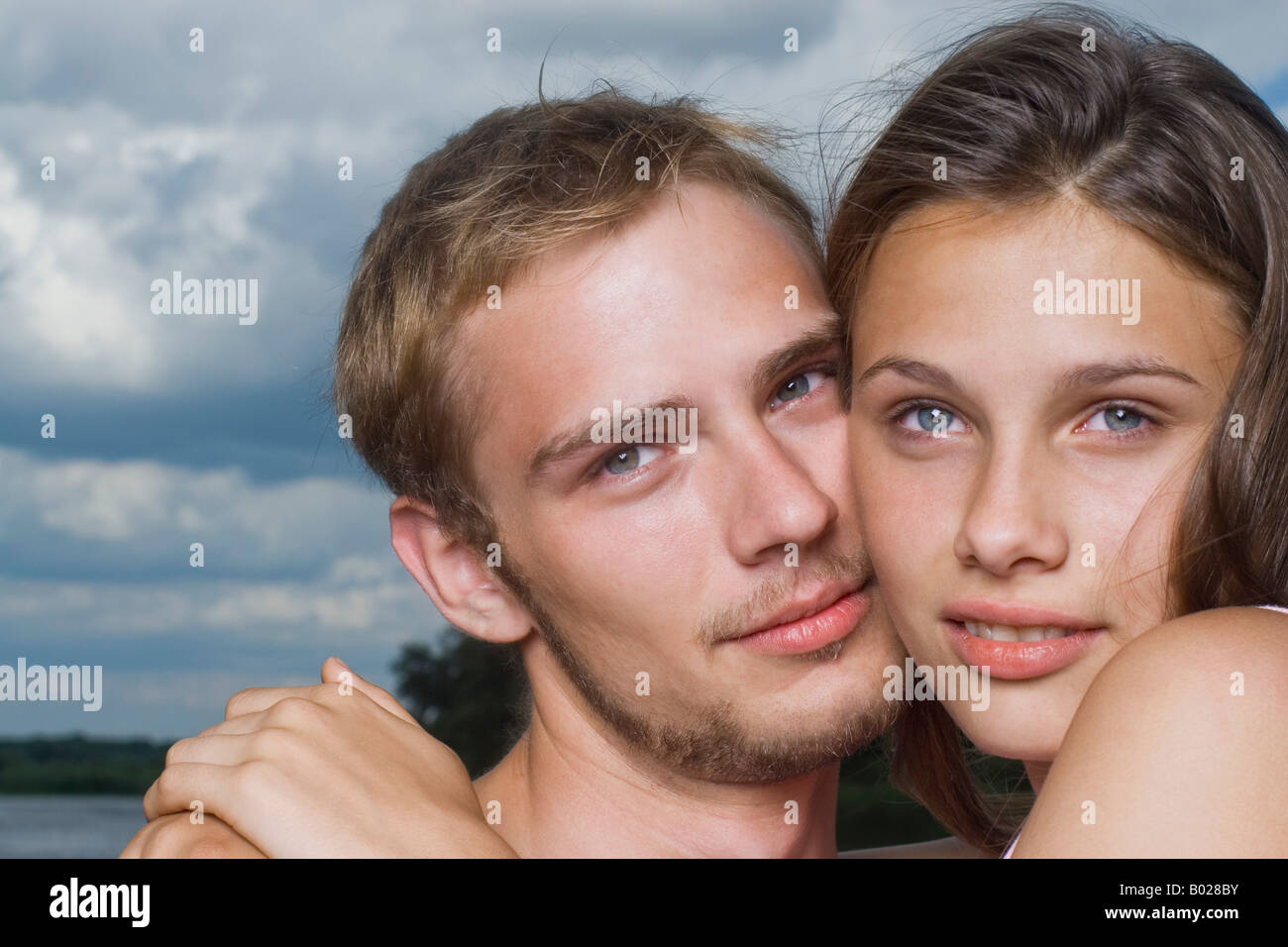 Headshot Of Young Couple Cheek To Cheek Stock Photo 17260879 Alamy