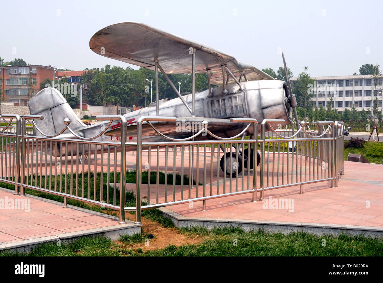 Mock up of propeller driven biplane outside the Museum of Revolutionary Base at Xinyang Henan Province China Asia Built in 1985 Stock Photo