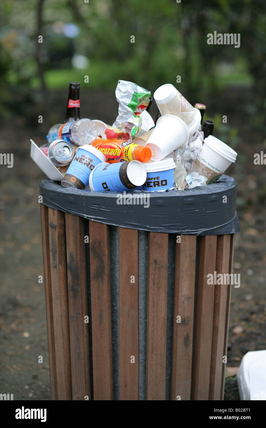 overfilled rubbish or trash bin Stock Photo - Alamy