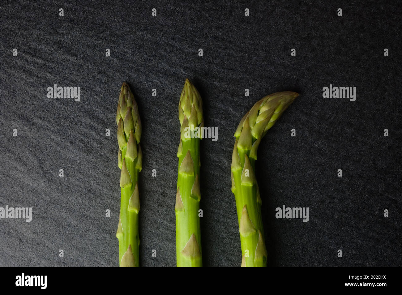 Three green asparagus Veggie fine art serie Stock Photo