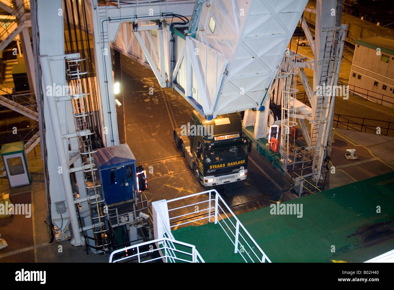 Lorries driving onto a cross channel ferry Dover England Stock Photo