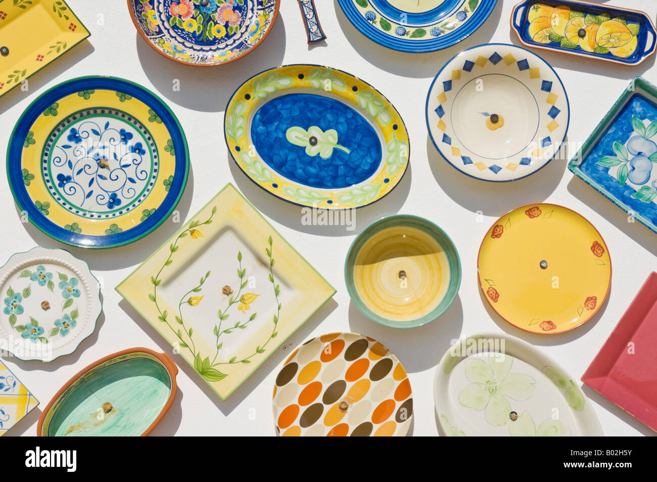 Traditional portuguese pottery plates on the wall of an artisan