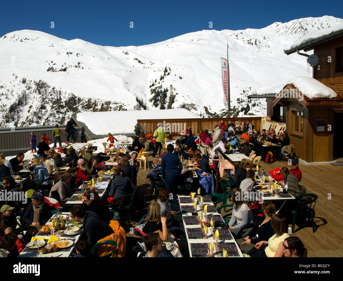 Diners at mountain ski restaurant in French Alps above Champagny en Vanoise Stock Photo