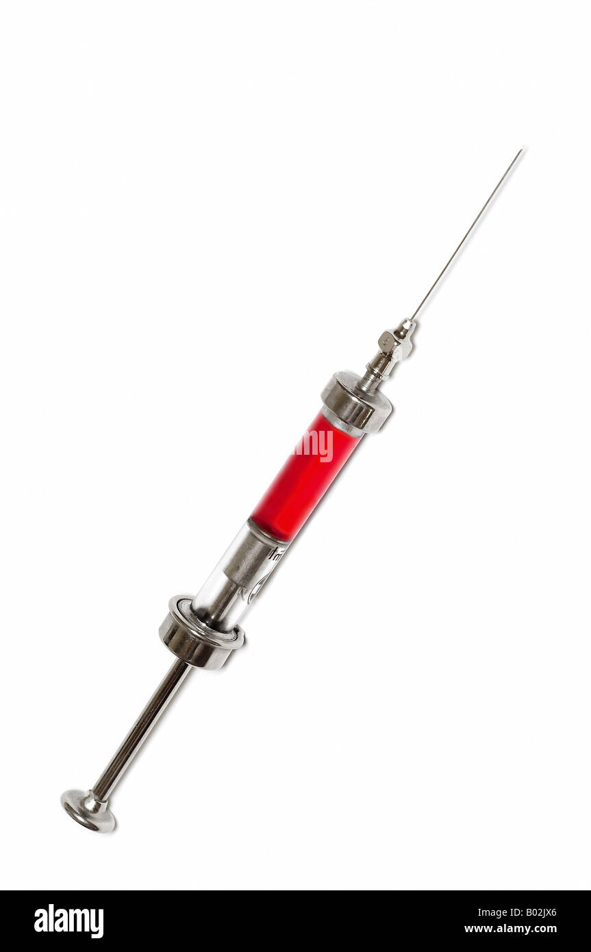 syringe with red liquid Stock Photo Alamy