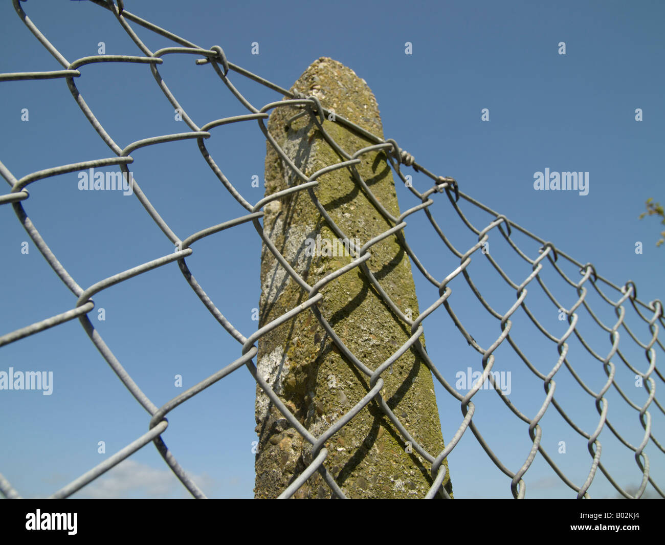 Wire fence with concrete post Stock Photo Alamy